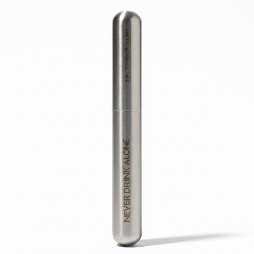 Metallic device with 'Never Drink Alone' text on a white background