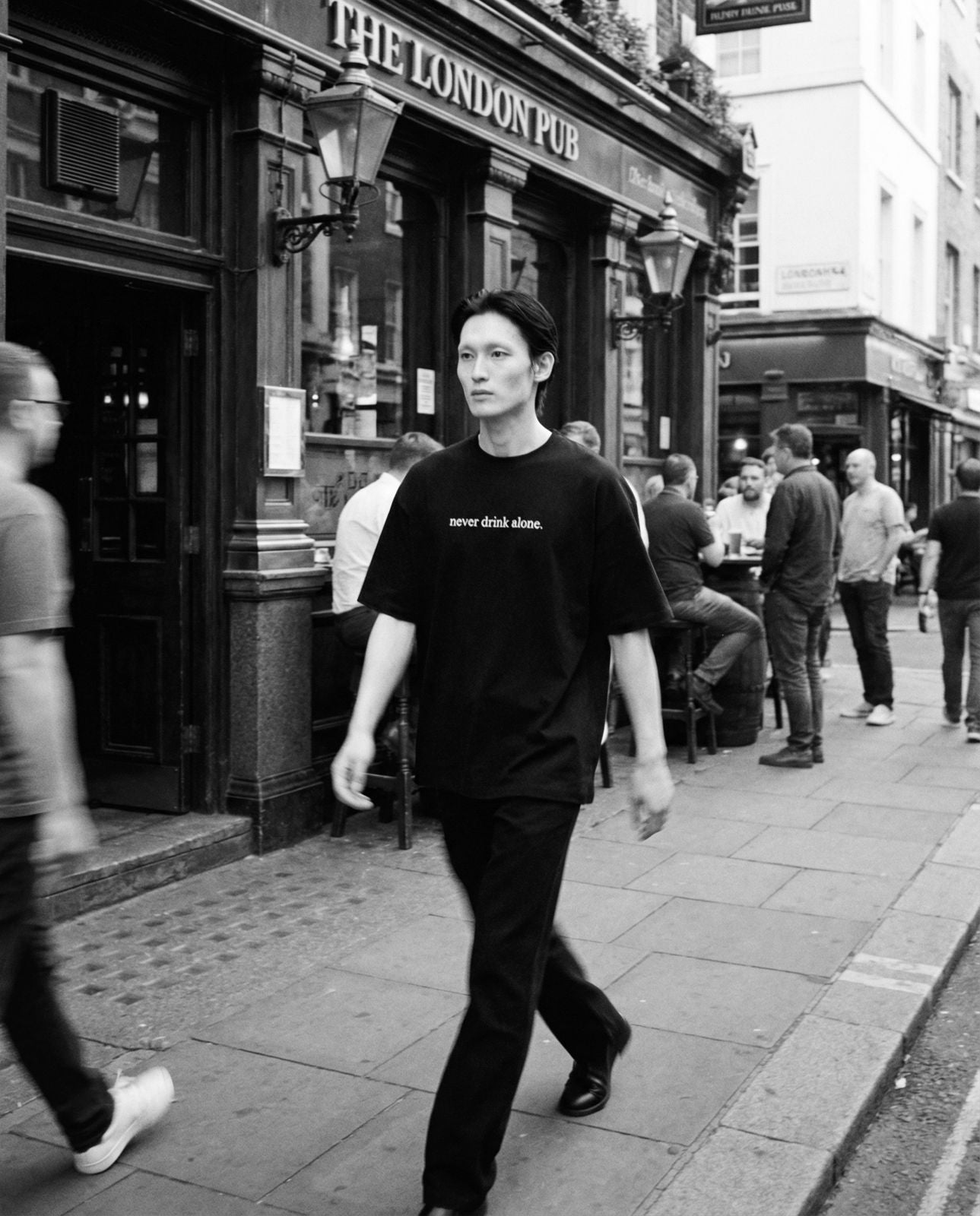 NEVER DRINK ALONE TEE