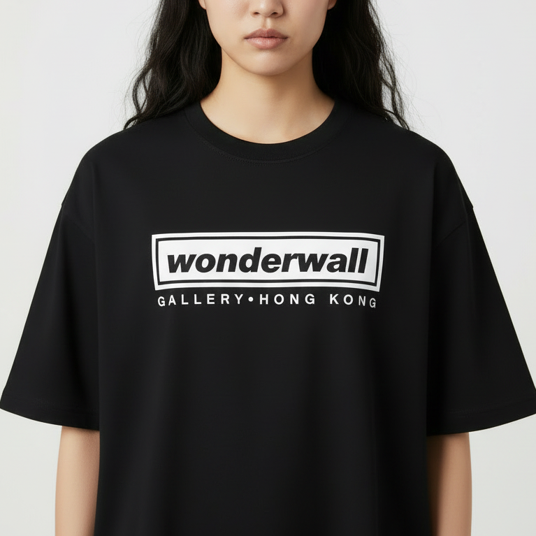 Person wearing a black t-shirt with 'wonderwall GALLERY HONG KONG' text on a white background