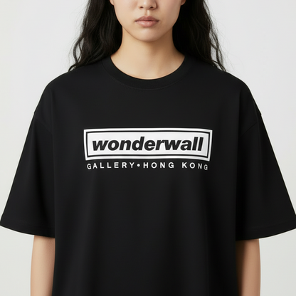 Person wearing a black t-shirt with 'wonderwall GALLERY HONG KONG' text on a white background