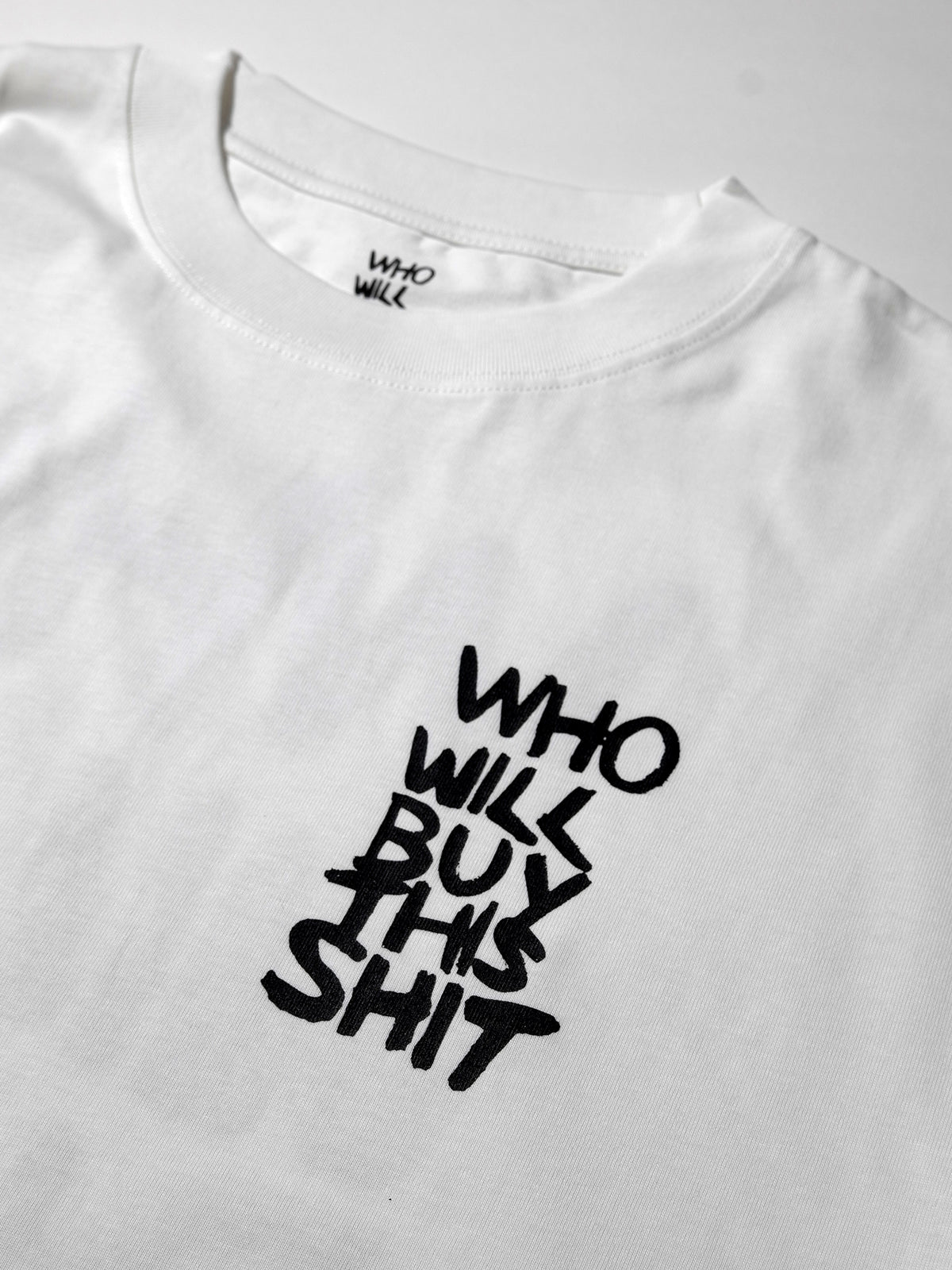 WHO WILL BUY THIS SHIT Logo Graphic Tee / White